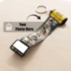 Camera roll photo keychain with photos being inserted, White Sheet version, by Memoriffy